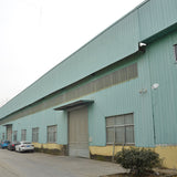 Portal frame factory building with crane