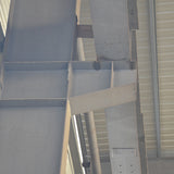 Portal frame factory building with crane