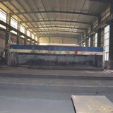 Portal frame factory building with crane