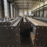 Portal frame factory building with crane